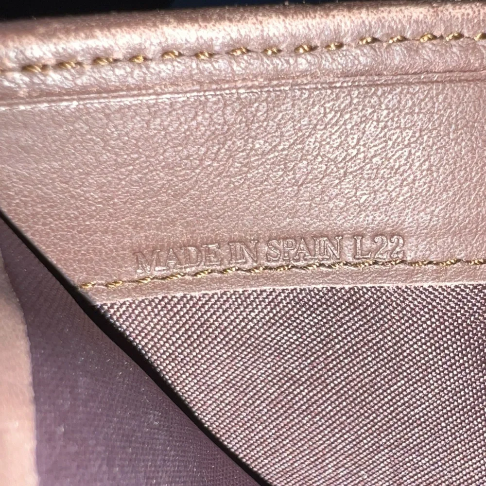 Loewe Amazona Vintage Anagram Suede bifold wallet.